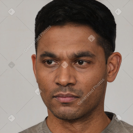 Neutral latino young-adult male with short  black hair and brown eyes