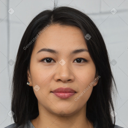 Joyful asian young-adult female with long  brown hair and brown eyes