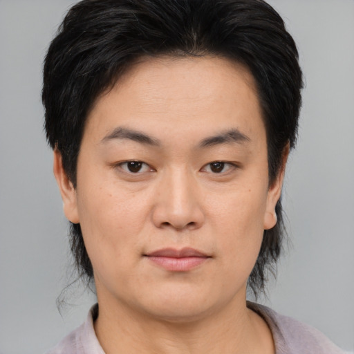 Neutral asian young-adult female with medium  black hair and brown eyes