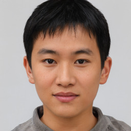 Neutral asian young-adult male with short  brown hair and brown eyes