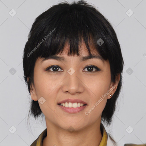 Joyful asian young-adult female with medium  black hair and brown eyes