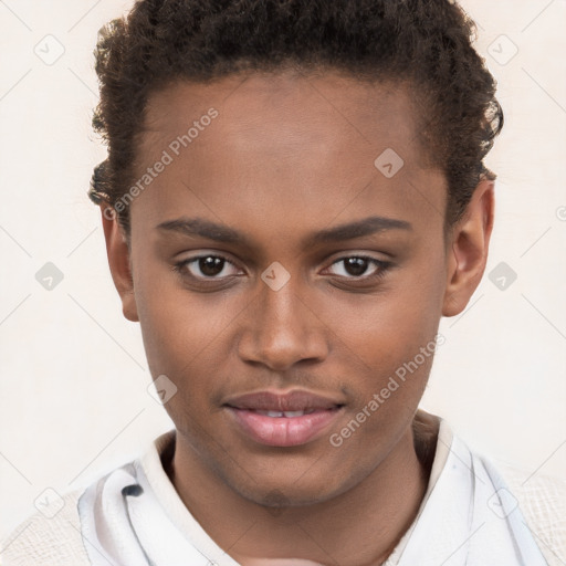 Joyful black young-adult male with short  brown hair and brown eyes