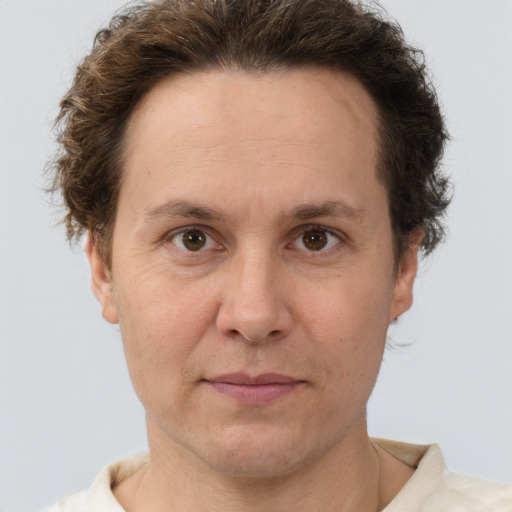 Neutral white adult male with short  brown hair and brown eyes