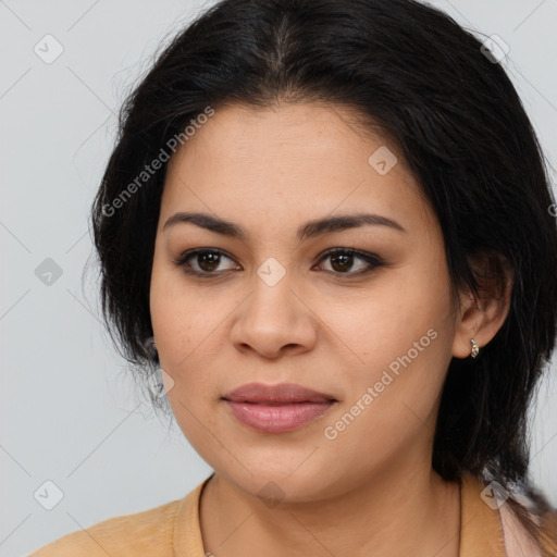 Joyful asian young-adult female with long  brown hair and brown eyes