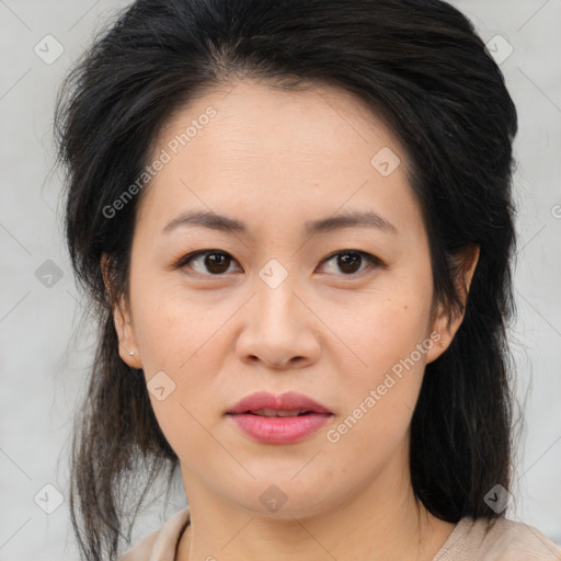 Joyful asian young-adult female with medium  brown hair and brown eyes