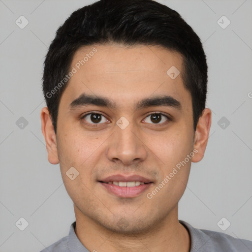 Joyful latino young-adult male with short  black hair and brown eyes