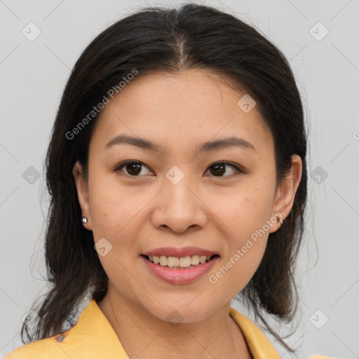 Joyful asian young-adult female with medium  brown hair and brown eyes