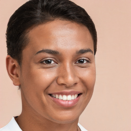 Joyful white young-adult female with short  brown hair and brown eyes