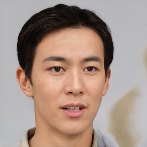 Neutral asian young-adult male with short  brown hair and brown eyes