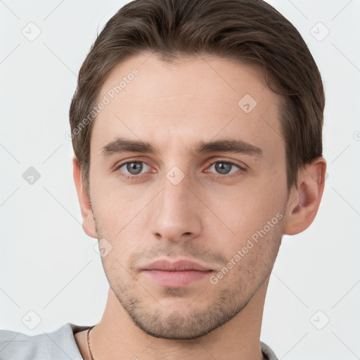 Neutral white young-adult male with short  brown hair and grey eyes