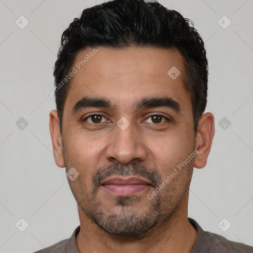 Neutral latino adult male with short  black hair and brown eyes