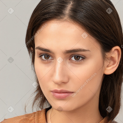 Neutral white young-adult female with medium  brown hair and brown eyes