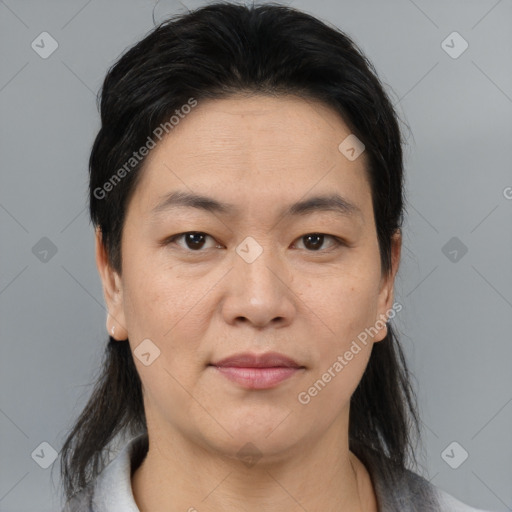 Joyful asian young-adult female with medium  brown hair and brown eyes