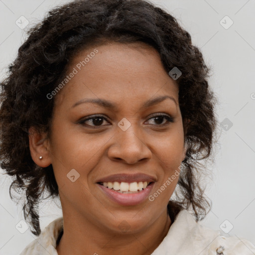 Joyful black young-adult female with medium  brown hair and brown eyes