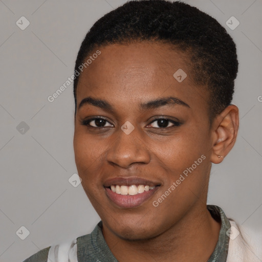 Joyful black young-adult female with short  black hair and brown eyes