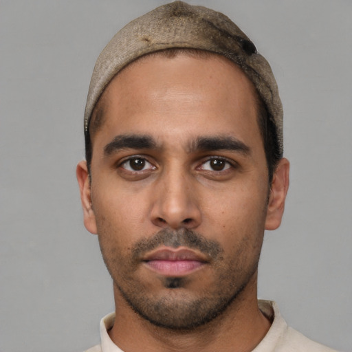 Neutral white young-adult male with short  black hair and brown eyes