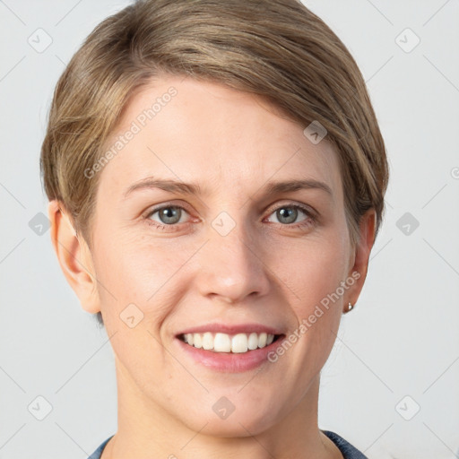 Joyful white young-adult female with short  brown hair and grey eyes