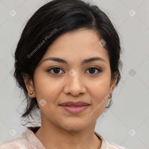 Joyful latino young-adult female with medium  brown hair and brown eyes