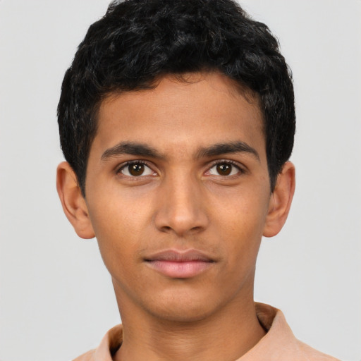 Neutral latino young-adult male with short  brown hair and brown eyes