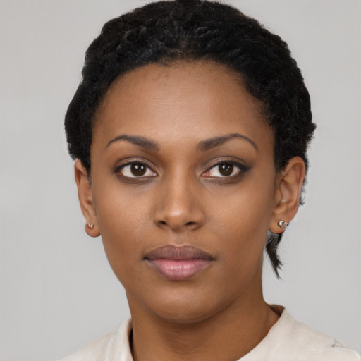 Neutral black young-adult female with short  black hair and brown eyes