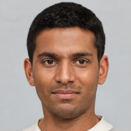 Neutral latino young-adult male with short  black hair and brown eyes