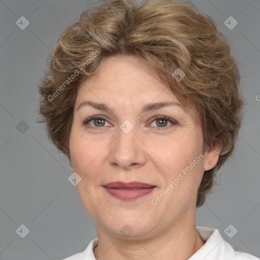 Joyful white adult female with short  brown hair and brown eyes