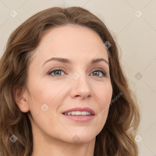 Joyful white young-adult female with long  brown hair and green eyes