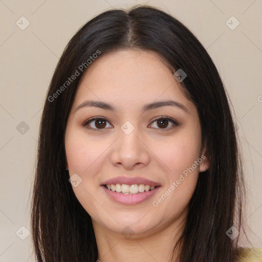 Joyful asian young-adult female with long  brown hair and brown eyes