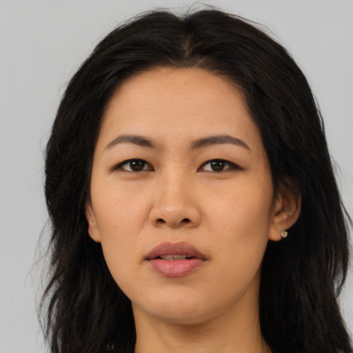 Neutral asian young-adult female with long  brown hair and brown eyes