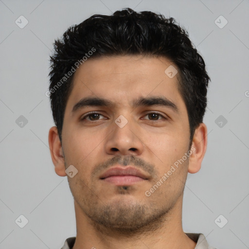 Neutral latino young-adult male with short  black hair and brown eyes