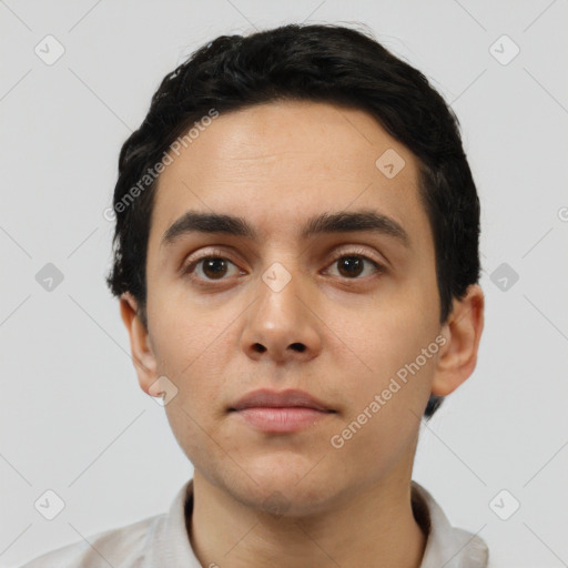 Neutral latino young-adult male with short  black hair and brown eyes