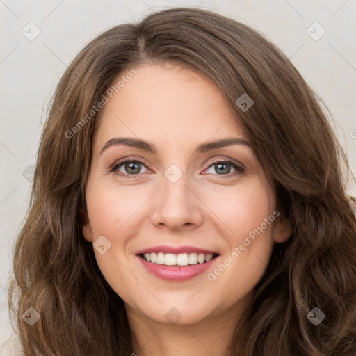 Joyful white young-adult female with long  brown hair and green eyes