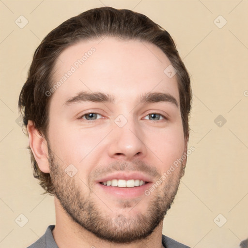 Neutral white young-adult male with short  brown hair and grey eyes