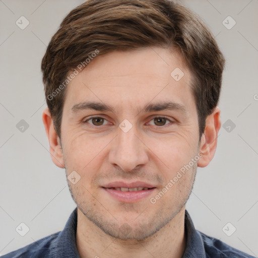 Joyful white adult male with short  brown hair and brown eyes