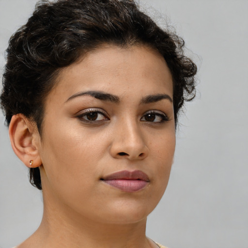 Neutral white young-adult female with short  brown hair and brown eyes