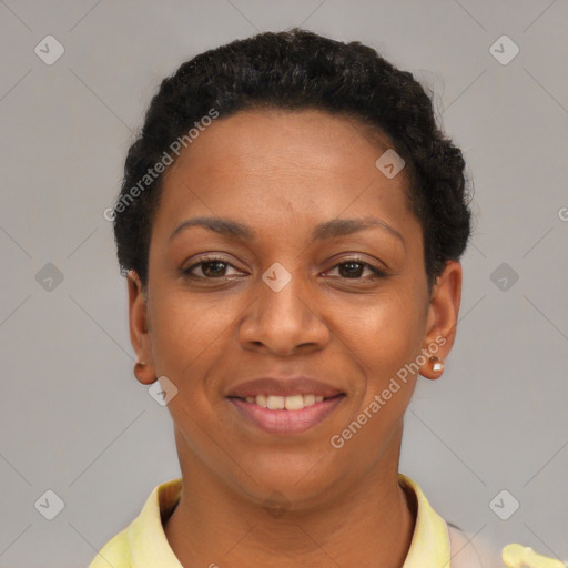 Joyful black young-adult female with short  black hair and brown eyes