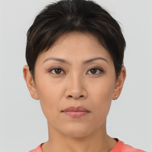 Neutral asian young-adult female with short  brown hair and brown eyes