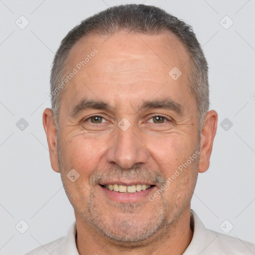 Joyful white adult male with short  brown hair and brown eyes