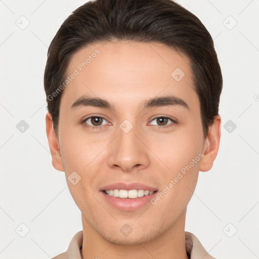 Joyful white young-adult male with short  brown hair and brown eyes