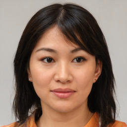 Neutral asian young-adult female with medium  brown hair and brown eyes