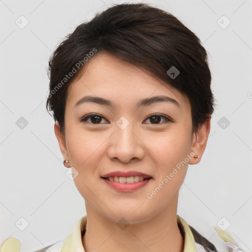 Joyful asian young-adult female with short  brown hair and brown eyes