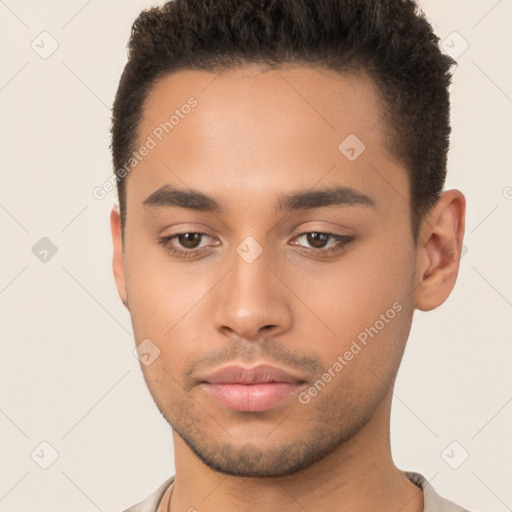 Neutral latino young-adult male with short  brown hair and brown eyes