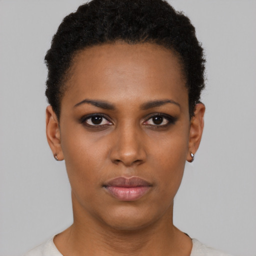 Neutral black young-adult female with short  black hair and brown eyes
