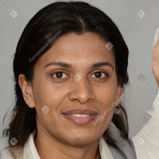 Joyful white adult female with medium  brown hair and brown eyes