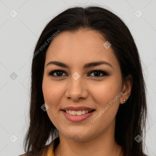 Joyful asian young-adult female with long  brown hair and brown eyes