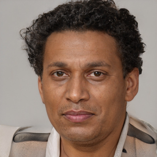 Neutral black adult male with short  brown hair and brown eyes