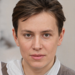 Joyful white adult female with short  brown hair and brown eyes