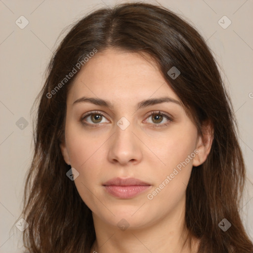 Neutral white young-adult female with long  brown hair and brown eyes