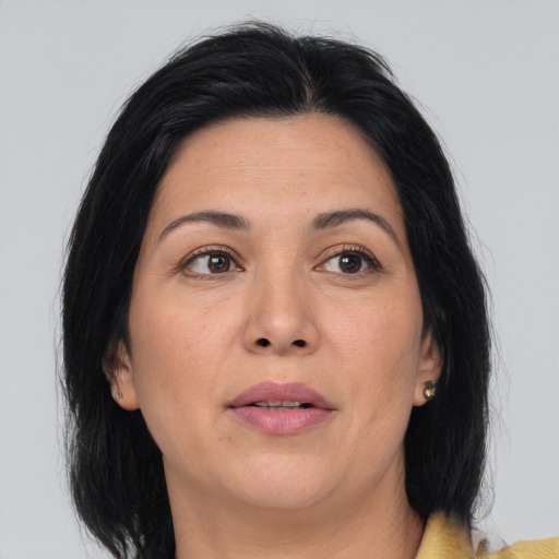Joyful asian adult female with medium  brown hair and brown eyes