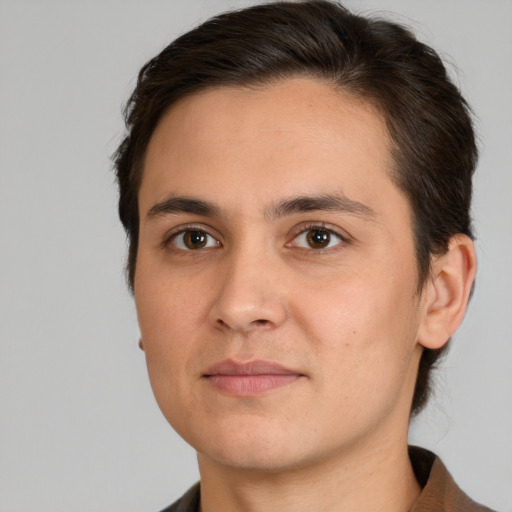 Joyful white young-adult male with short  brown hair and brown eyes